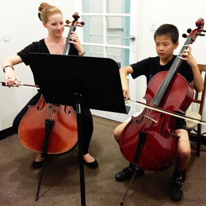 Child in a cello lesson