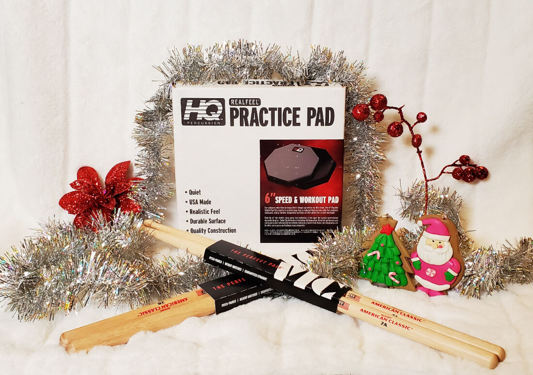 RealFeel practice pad and drum sticks